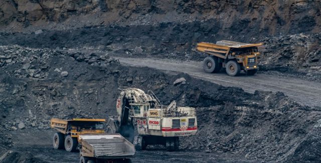 Diggers and other heavy vehicles at Shotton opencast coal mine in Northumberland