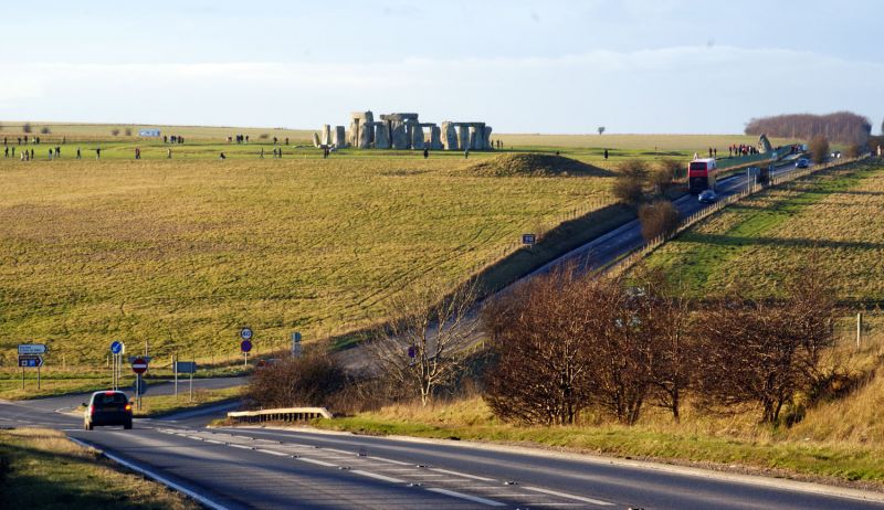 Stonehenge in distance and roads running close to Stonehenge.