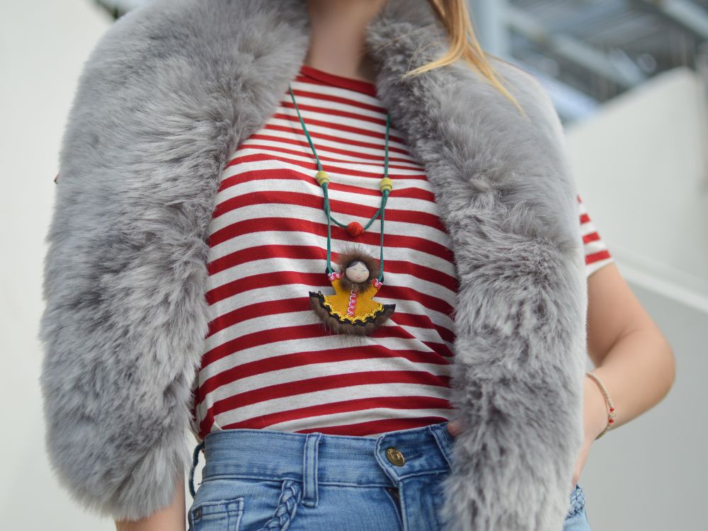 Young woman wearing Tshirt and faux fur