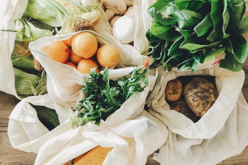 Zero waste solution: several tote bags containing groceries