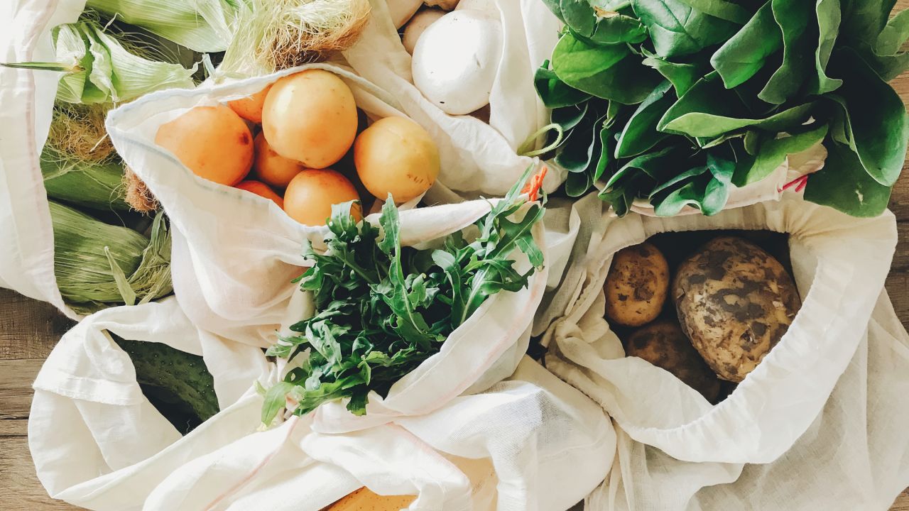 Zero waste solution: several tote bags containing groceries