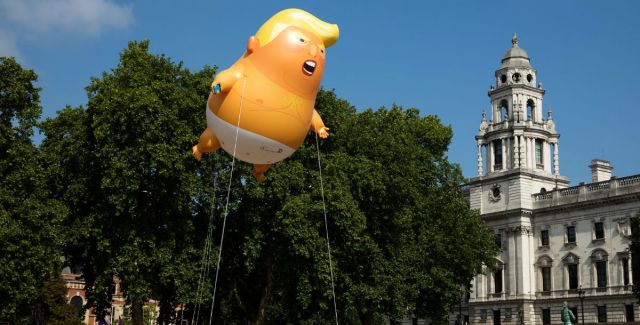 Trump baby blimp flying at the Trump protest in London, July 2018