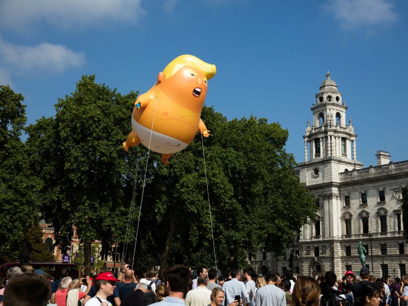 Trump baby blimp flying at the Trump protest in London, July 2018