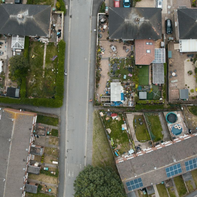 aerial photo of houses and gardens