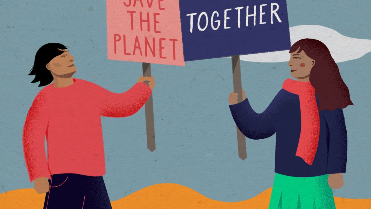 Couple protesting to save the planet together