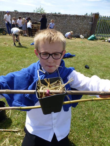Woodingdean Primary School - child making bug hotel 