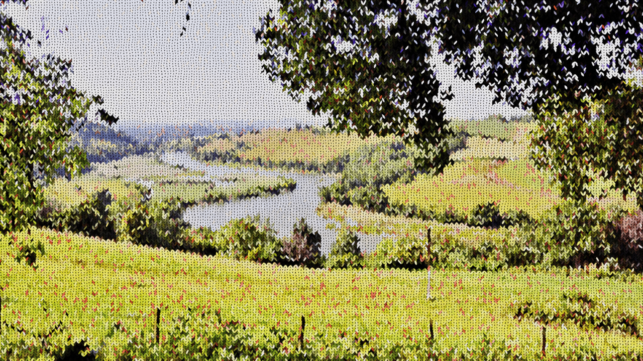 A beautiful english landscape with streams, lush grass and trees. The image has been edited so the landscape looks knitted.
