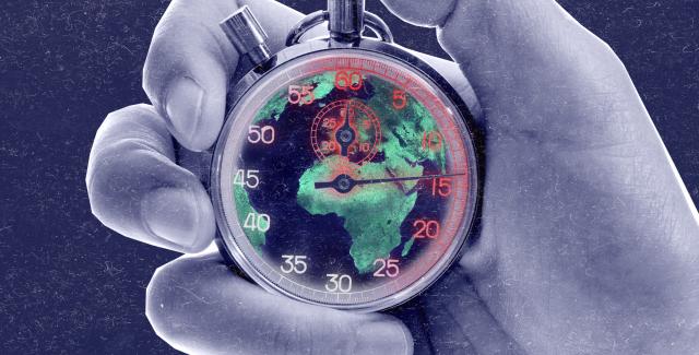 Hand holding a ticking clock