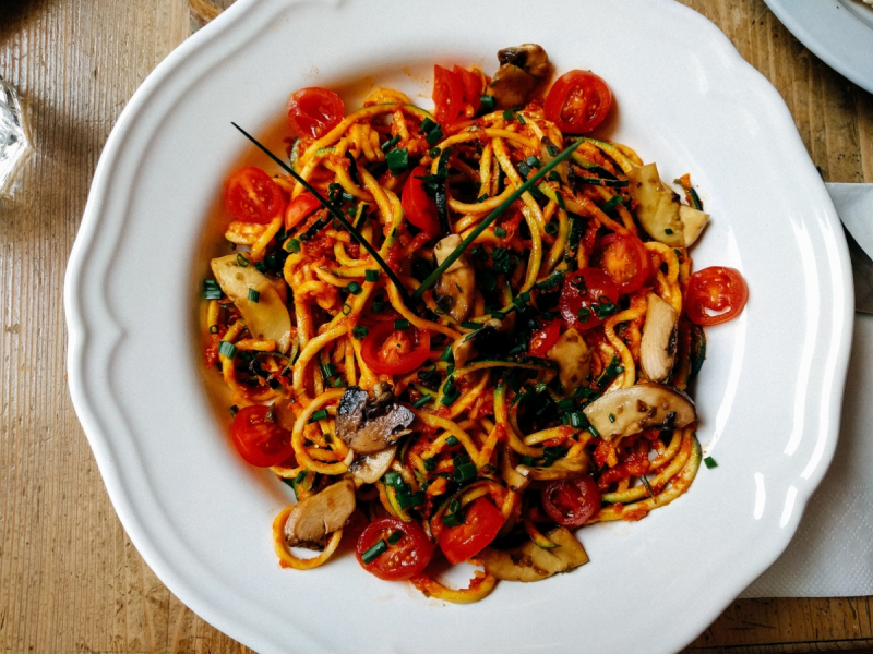 Large dish of budget-busting spaghetti and roasted vegetables