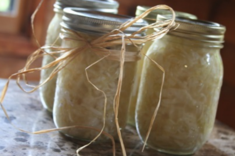 Homemade sauerkraut (fermented cabbage) preserved in 4 gift jars