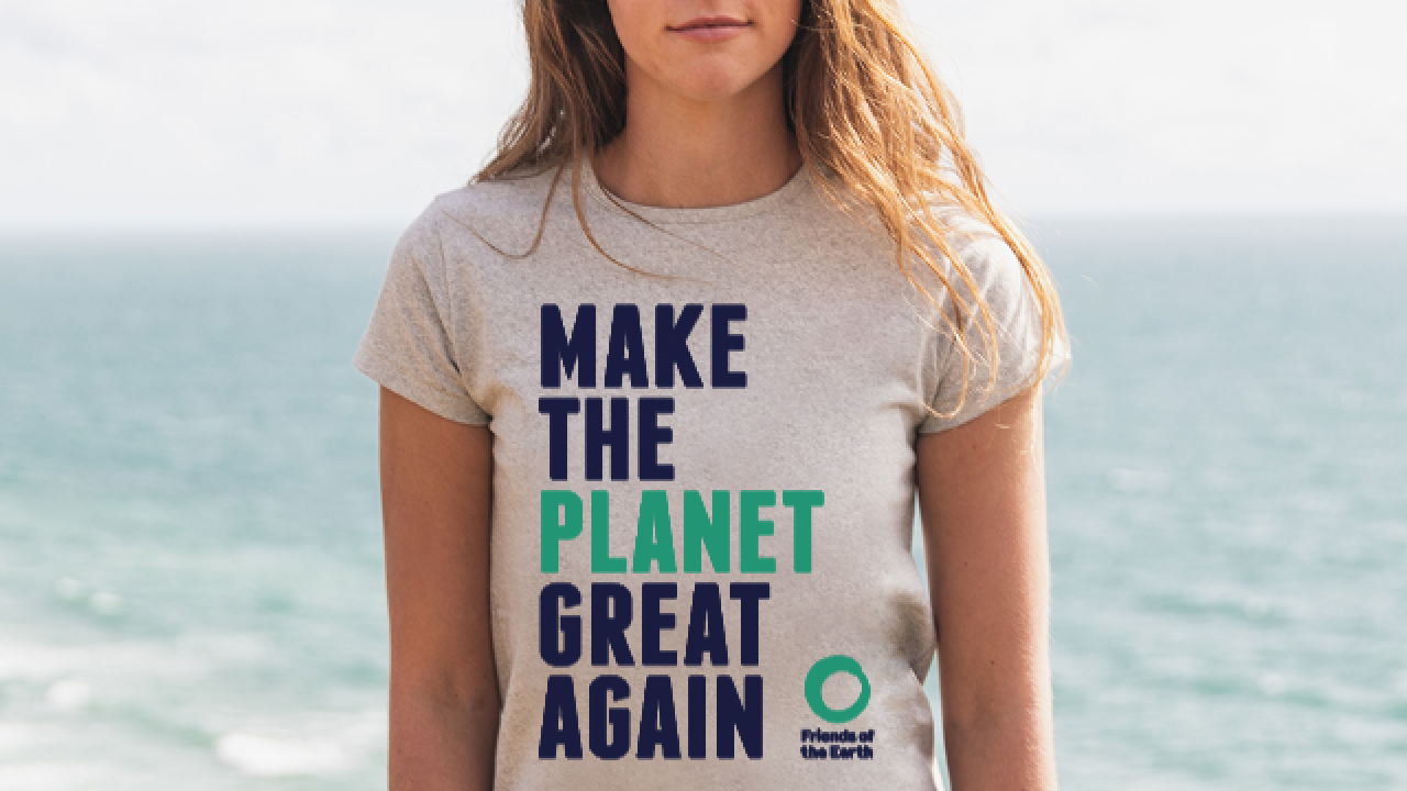 female model wearing Make the Planet Great Again tshirt
