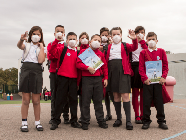School kids with Clean Air school packs and air monitoring tubes