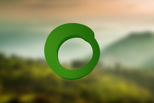 Stylised 3D Friends of the Earth logo in front of a foggy hillside